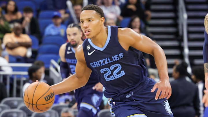 Oct 11, 2022; Orlando, Florida, USA; Memphis Grizzlies guard Desmond Bane (22) brings the ball up court during the second half against the Orlando Magic at Amway Center. Mandatory Credit: Mike Watters-Imagn Images Oct 11, 2022; Orlando, Florida, USA; Memphis Grizzlies guard Desmond Bane (22) brings the ball up court during the second half against the Orlando Magic at Amway Center. Mandatory Credit: Mike Watters-Imagn Images