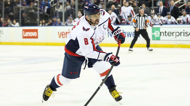 Oct 12, 2025; New York, New York, USA;  Washington Capitals left wing Alex Ovechkin (8) attempts a shot on goal in the first period against the New York Rangers at Madison Square Garden. Mandatory Credit: Wendell Cruz-Imagn Images
