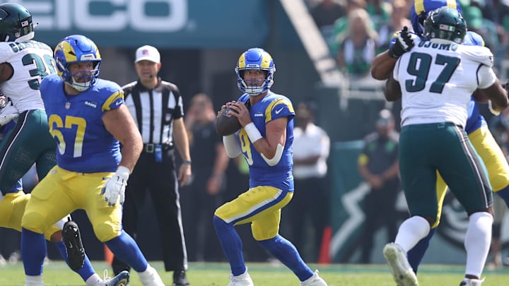 Sep 21, 2025; Philadelphia, Pennsylvania, USA; Los Angeles Rams quarterback Matthew Stafford (9) drops back to pass against the Philadelphia Eagles during the first half at Lincoln Financial Field. Mandatory Credit: Bill Streicher-Imagn Images Sep 21, 2025; Philadelphia, Pennsylvania, USA; Los Angeles Rams quarterback Matthew Stafford (9) drops back to pass against the Philadelphia Eagles during the first half at Lincoln Financial Field. Mandatory Credit: Bill Streicher-Imagn Images