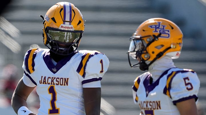Dec 6, 2024; Birmingham, AL, USA; Jackson's Landon Duckworth (1) and Jackson's Chris Payne (5) talk during a timeout during the game with Cherokee County at Protective Stadium in the AHSAA 4A State Championship game. Dec 6, 2024; Birmingham, AL, USA; Jackson's Landon Duckworth (1) and Jackson's Chris Payne (5) talk during a timeout during the game with Cherokee County at Protective Stadium in the AHSAA 4A State Championship game.