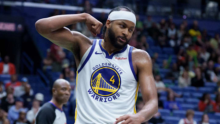 Nov 16, 2025; New Orleans, Louisiana, USA;  Golden State Warriors guard Moses Moody (4) reacts after a dunk against the New Orleans Pelicans during the second half at Smoothie King Center. Mandatory Credit: Matthew Hinton-Imagn Images