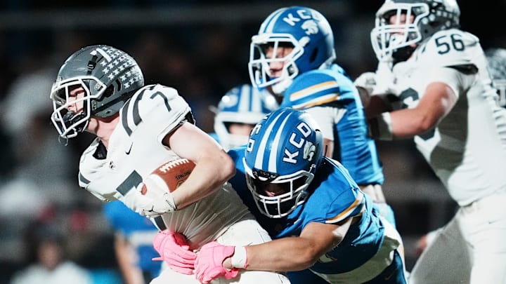 Kentucky Country Day's defense pressured Holy Cross during the Bearcats 47-20 win in KHSAA high school football Friday, Oct. 10, 2025.