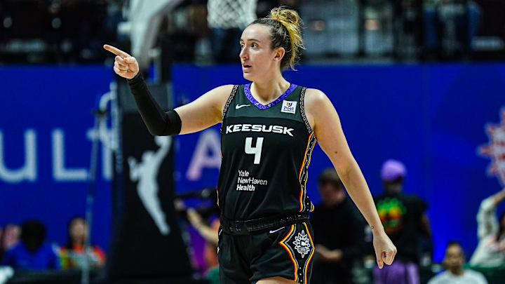 Oct 6, 2024; Uncasville, Connecticut, USA; Connecticut Sun guard Marina Mabrey (4) reacts after her basket against the Minnesota Lynx in the second half during game four of the 2024 WNBA Semi-finals at Mohegan Sun Arena. Mandatory Credit: David Butler II-Imagn Images