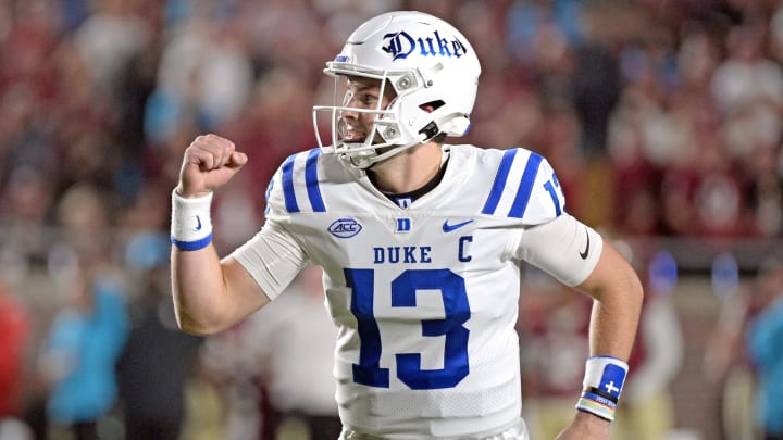 Oct 21, 2023; Tallahassee, Florida, USA; Duke Blue Devils quarterback Riley Leonard (13) celebrates a touchdown during the first quarter against the Florida State Seminoles at Doak S. Campbell Stadium. Oct 21, 2023; Tallahassee, Florida, USA; Duke Blue Devils quarterback Riley Leonard (13) celebrates a touchdown during the first quarter against the Florida State Seminoles at Doak S. Campbell Stadium.