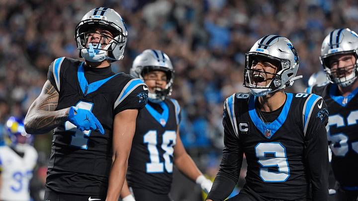 Jan 10, 2026; Charlotte, NC, USA; Carolina Panthers quarterback Bryce Young (9) reacts after scoring a touchdown against the Los Angeles Rams in the first half during the NFC Wild Card Round game at Bank of America Stadium. Mandatory Credit: Jim Dedmon-Imagn Images Jan 10, 2026; Charlotte, NC, USA; Carolina Panthers quarterback Bryce Young (9) reacts after scoring a touchdown against the Los Angeles Rams in the first half during the NFC Wild Card Round game at Bank of America Stadium. Mandatory Credit: Jim Dedmon-Imagn Images