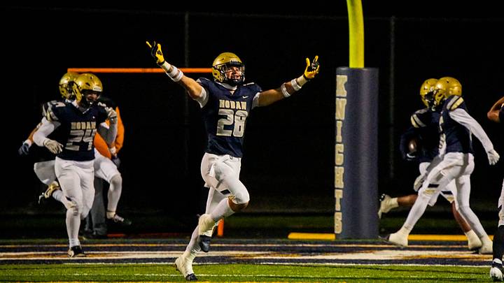 Hoban’s Brydon Feister (28) and fellow teammates celebrate a pick six against St. Edward by Hoban’s Jackson Callaway (13), off camera, Oct. 24, 2025, at Dowed Field in Akron, Ohio. Hoban’s Brydon Feister (28) and fellow teammates celebrate a pick six against St. Edward by Hoban’s Jackson Callaway (13), off camera, Oct. 24, 2025, at Dowed Field in Akron, Ohio.