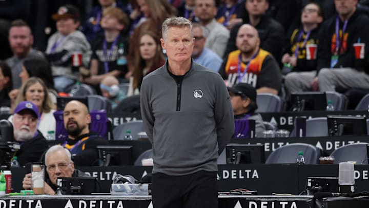 Golden State Warriors head coach Kerr watches his team from the sidelines during the second half against the Utah Jazz at Delta Center. Golden State Warriors head coach Kerr watches his team from the sidelines during the second half against the Utah Jazz at Delta Center.