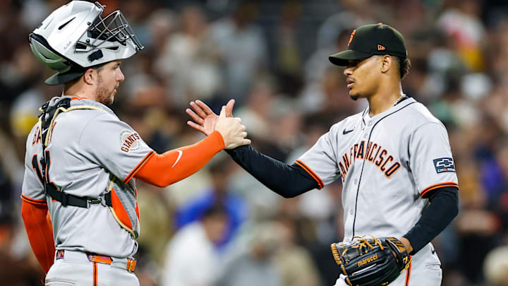 Aug 18, 2025; San Diego, California; San Francisco Giants catcher Patrick Bailey (14) celebrates with relief pitcher Randy Rodriguez (73) after defeating the San Diego Padres at Petco Park. Aug 18, 2025; San Diego, California; San Francisco Giants catcher Patrick Bailey (14) celebrates with relief pitcher Randy Rodriguez (73) after defeating the San Diego Padres at Petco Park.