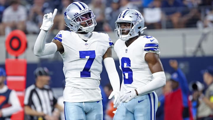 Dallas Cowboys CB Trevon Diggs celebrates with S Donovan Wilson during the first half against the Detroit Lions.