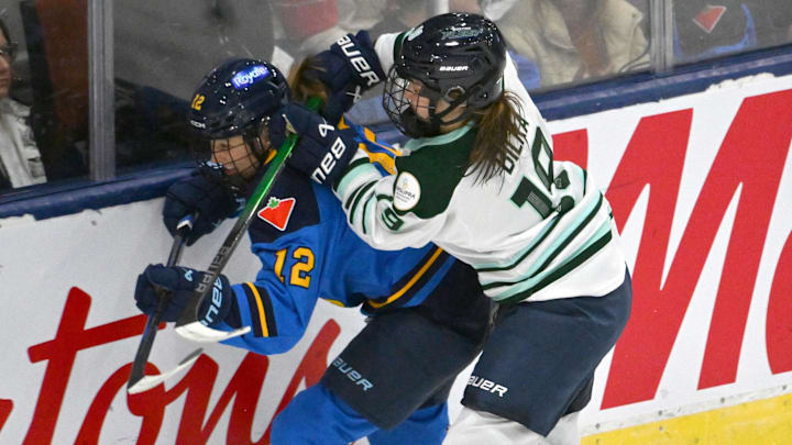 Nov 30, 2024; Toronto, ON, CANADA; Boston Fleet forward Hannah Bilka (19) collides with Toronto Sceptres defender Allie Munroe (12) in the second period at Coca-Cola Coliseum. Mandatory Credit: Dan Hamilton-Imagn Images Nov 30, 2024; Toronto, ON, CANADA; Boston Fleet forward Hannah Bilka (19) collides with Toronto Sceptres defender Allie Munroe (12) in the second period at Coca-Cola Coliseum. Mandatory Credit: Dan Hamilton-Imagn Images