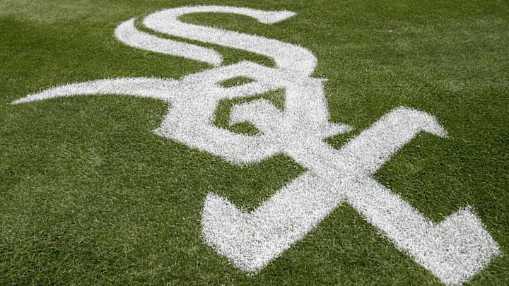 The Chicago White Sox logo painted on the grass at Rate Field. 