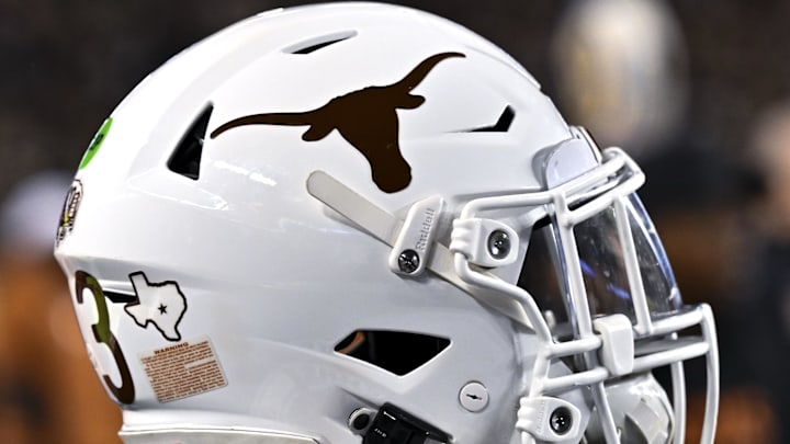 Nov 30, 2024; College Station, Texas, USA; A detail view of a Texas Longhorns helmet on the sideline during the first quarter against the Texas A&M Aggies. The Longhorns defeated the Aggies 17-7 at Kyle Field. Mandatory Credit: Maria Lysaker-Imagn Images Nov 30, 2024; College Station, Texas, USA; A detail view of a Texas Longhorns helmet on the sideline during the first quarter against the Texas A&M Aggies. The Longhorns defeated the Aggies 17-7 at Kyle Field. Mandatory Credit: Maria Lysaker-Imagn Images