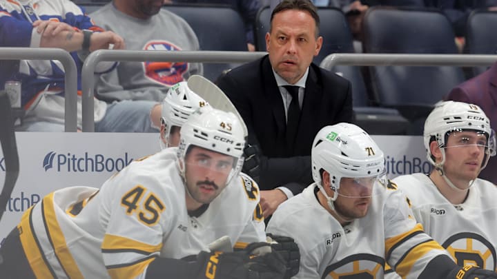 Nov 4, 2025; Elmont, New York, USA; Boston Bruins head coach Marco Sturm coaches against the New York Islanders during the second period at UBS Arena. Mandatory Credit: Brad Penner-Imagn Images