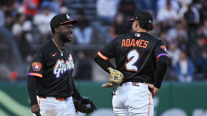 San Francisco Giants shortstop Osleivis Basabe (39) and shortstop Willy Adames (2) look at each other after the third out of the third inning in the game against the Houston Astros at Oracle Park. Mandatory Credit: Ed Szczepanski-Imagn Images San Francisco Giants shortstop Osleivis Basabe (39) and shortstop Willy Adames (2) look at each other after the third out of the third inning in the game against the Houston Astros at Oracle Park. Mandatory Credit: Ed Szczepanski-Imagn Images
