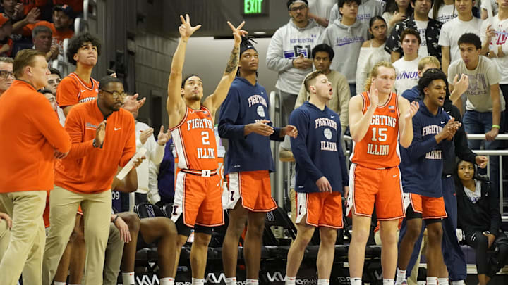Dec 6, 2024; Evanston, Illinois, USA; The Illinois Fighting Illini celebrate a three point basket against the Northwestern Wildcats during the second half at Welsh-Ryan Arena. Mandatory Credit: David Banks-Imagn Images Dec 6, 2024; Evanston, Illinois, USA; The Illinois Fighting Illini celebrate a three point basket against the Northwestern Wildcats during the second half at Welsh-Ryan Arena. Mandatory Credit: David Banks-Imagn Images