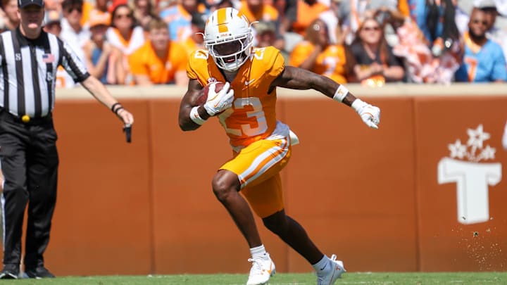 Sep 20, 2025; Knoxville, Tennessee, USA;  Tennessee Volunteers defensive back Boo Carter (23) returns a punt against the UAB Blazers during the first quarter at Neyland Stadium. Mandatory Credit: Randy Sartin-Imagn Images