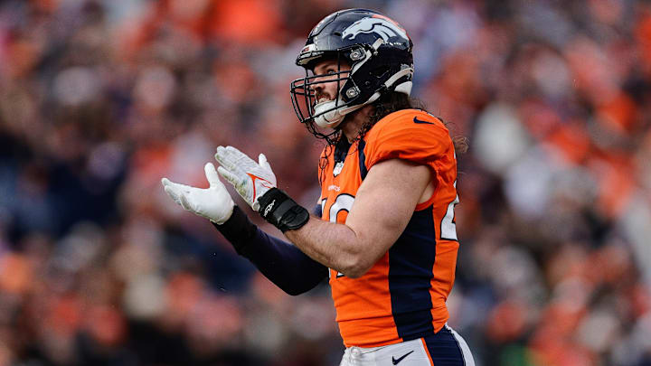Dec 31, 2023; Denver, Colorado, USA; Denver Broncos linebacker Alex Singleton (49) reacts after a play in the second quarter against the Los Angeles Chargers at Empower Field at Mile High. Mandatory Credit: Isaiah J. Downing-Imagn Images