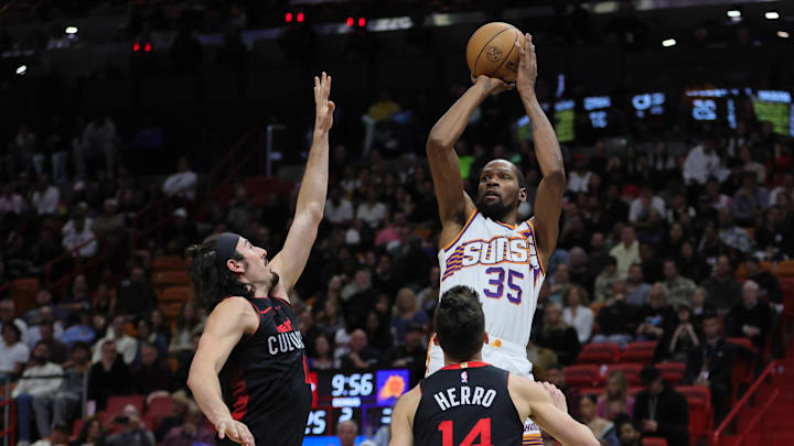 Jan 29, 2024; Miami, Florida, USA; Phoenix Suns forward Kevin Durant (35) shoots the basketball over Miami Heat guard Jaime Jaquez Jr. (11) and guard Tyler Herro (14) during the second quarter at Kaseya Center. Mandatory Credit: Sam Navarro-Imagn Images Jan 29, 2024; Miami, Florida, USA; Phoenix Suns forward Kevin Durant (35) shoots the basketball over Miami Heat guard Jaime Jaquez Jr. (11) and guard Tyler Herro (14) during the second quarter at Kaseya Center. Mandatory Credit: Sam Navarro-Imagn Images