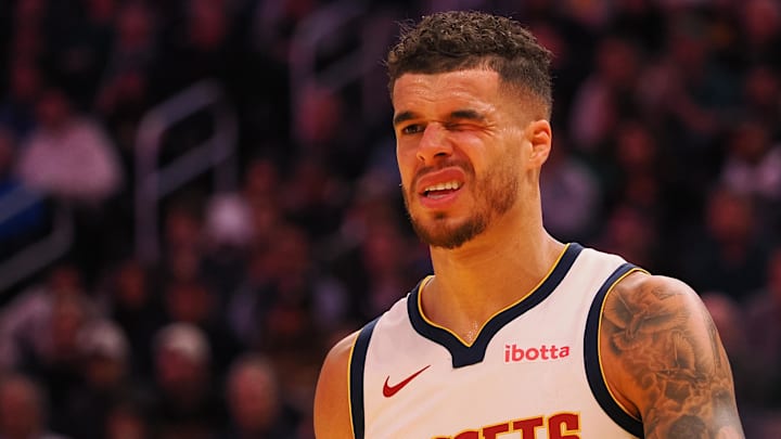Mar 17, 2025; San Francisco, California, USA; Denver Nuggets forward Michael Porter Jr. (1) squints after a play against the Golden State Warriors during the third quarter at Chase Center.