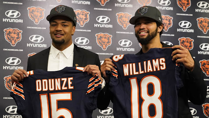 Apr 26, 2024; Lake Forest, IL, USA; Chicago Bears first round draft choices Rome Odunze (left) and