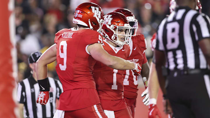 Sep 12, 2025; Houston, Texas, USA; Houston Cougars quarterback Conner Weigman (1) celebrates after running with the ball for a touhdown during the fourth quarter against the Colorado Buffaloes at TDECU Stadium. Mandatory Credit: Troy Taormina-Imagn Images