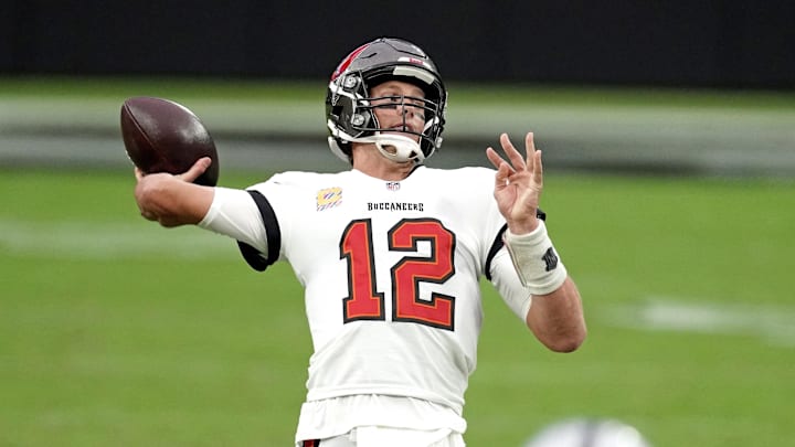 Oct 25, 2020; Paradise, Nevada, USA; Tampa Bay Buccaneers quarterback Tom Brady (12) throws a pass against the Las Vegas Raiders during the second half at Allegiant Stadium. Mandatory Credit: Kirby Lee-USA TODAY Sports