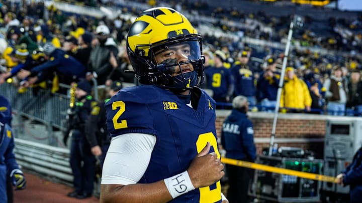 Michigan quarterback Jadyn Davis (2) takes the field for warm up before the Michigan State game at Michigan Stadium in Ann Arbor on Saturday, Oct. 26, 2024.