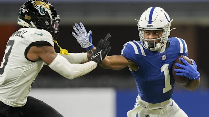Jan 5, 2025; Indianapolis, Indiana, USA; Indianapolis Colts wide receiver Josh Downs (1) reaches to push off Jacksonville Jaguars cornerback Tyson Campbell (3) during a game against the Jacksonville Jaguars at Lucas Oil Stadium at Lucas Oil Stadium. Mandatory Credit: Grace Hollars/USA TODAY Network via Imagn Images Jan 5, 2025; Indianapolis, Indiana, USA; Indianapolis Colts wide receiver Josh Downs (1) reaches to push off Jacksonville Jaguars cornerback Tyson Campbell (3) during a game against the Jacksonville Jaguars at Lucas Oil Stadium at Lucas Oil Stadium. Mandatory Credit: Grace Hollars/USA TODAY Network via Imagn Images