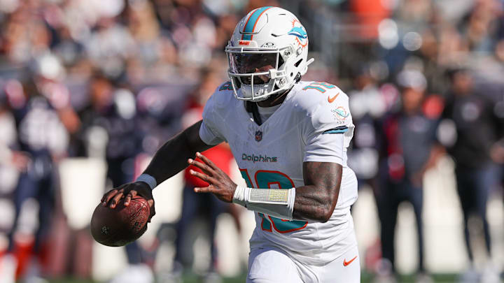 Miami Dolphins quarterback Tyler Huntley (18) throws the ball during the first half against the New England Patriots at Gillette Stadium. Miami Dolphins quarterback Tyler Huntley (18) throws the ball during the first half against the New England Patriots at Gillette Stadium.