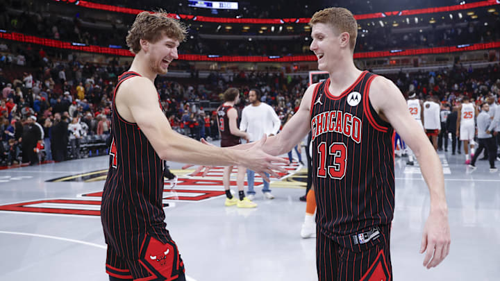 Oct 31, 2025; Chicago, Illinois, USA; Chicago Bulls forward Matas Buzelis (14) celebrates with guard Kevin Huerter (13) after team's win against the New York Knicks at United Center. Mandatory Credit: Kamil Krzaczynski-Imagn Images