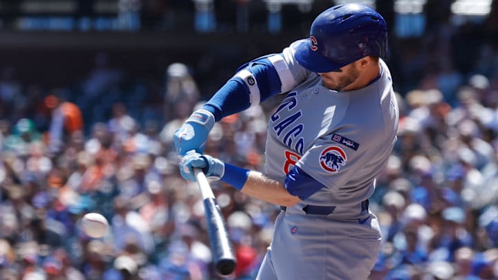 Chicago Cubs left fielder Ian Happ (8) hits an RBI single during the first inning against the San Francisco Giants at Oracle Park. Chicago Cubs left fielder Ian Happ (8) hits an RBI single during the first inning against the San Francisco Giants at Oracle Park.