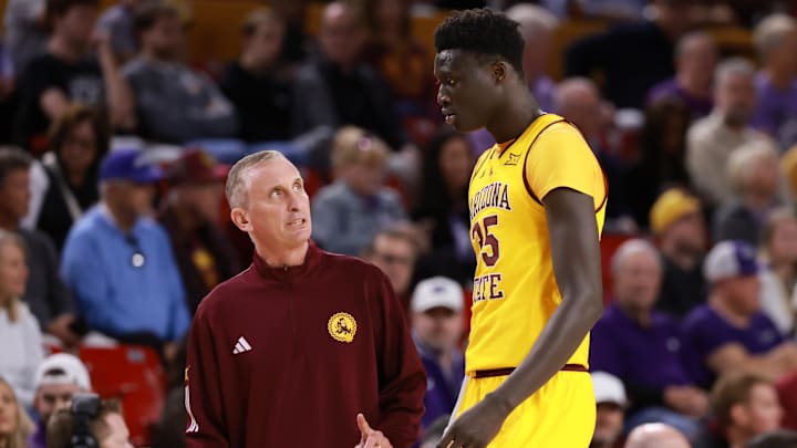 Jan 10, 2026; Tempe, Arizona, USA; Arizona State Sun Devils head coach Bobby Hurley with center Massamba Diop (35) against the Kansas State Wildcats in the second half at Desert Financial Arena. Mandatory Credit: Mark J. Rebilas-Imagn Images