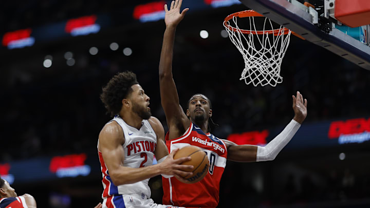 Nov 17, 2024; Washington, District of Columbia, USA; Detroit Pistons guard Cade Cunningham (2) shoots the ball as Washington Wizards forward Alexandre Sarr (20) defends in the first half at Capital One Arena. Mandatory Credit: Geoff Burke-Imagn Images