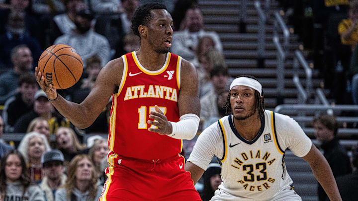 Atlanta Hawks forward Onyeka Okongwu (17) holds the ball against Indiana Pacers center Myles Turner (33) in the second half at Gainbridge Fieldhouse.