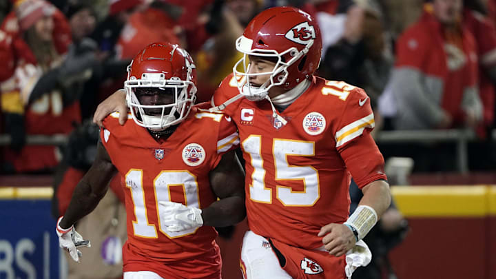 Jan 23, 2022; Kansas City, Missouri, USA; Kansas City Chiefs wide receiver Tyreek Hill (10) celebrates his touchdown with quarterback Patrick Mahomes (15) against the Buffalo Bills during the second half of the AFC Divisional playoff football game at GEHA Field at Arrowhead Stadium. Mandatory Credit: Denny Medley-Imagn Images