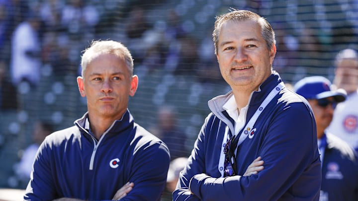 Oct 1, 2022; Chicago, Illinois, USA; Chicago Cubs Chairman Tom Ricketts (R) smiles next to Chicago Cubs President of baseball operations Jed Hoyer (L) before a baseball game between the Chicago Cubs and Cincinnati Reds at Wrigley Field. Mandatory Credit: Kamil Krzaczynski-Imagn Images