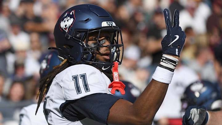Oct 18, 2025; Chestnut Hill, Massachusetts, USA; UConn Huskies tight end Juice Vereen (11) reacts after scoring a touchdown during the second half against the Boston College Eagles at Alumni Stadium. Mandatory Credit: Bob DeChiara-Imagn Images