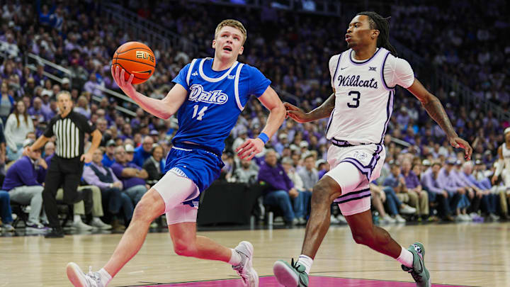 Stirtz drives against Kansas State guard C.J. Jones during a game in December.