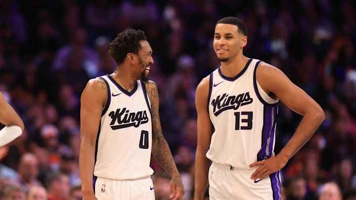Mar 14, 2025; Phoenix, Arizona, USA; Sacramento Kings guard Malik Monk (0) and forward Keegan Murray (13) against the Phoenix Suns at Footprint Center. Mandatory Credit: Mark J. Rebilas-Imagn Images