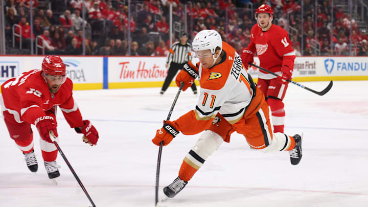 Trevor Zegras (11) snaps a shot for the Anaheim Ducks as they take on the Detroit Red Wings.
