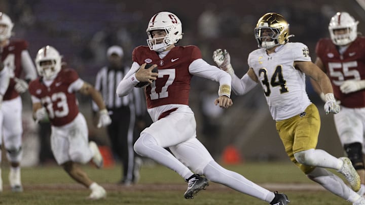 Nov 29, 2025; Stanford, California, USA;  Stanford Cardinal quarterback Charlie Mirer (17) runs with the football during the fourth quarter against the Notre Dame Fighting Irish at Stanford Stadium.