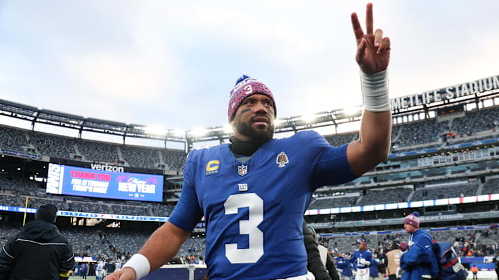 New York Giants quarterback Russell Wilson (3) waves to fans after the game against the Dallas Cowboys at MetLife Stadium.