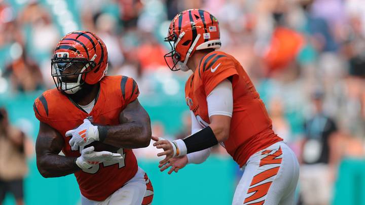 Oct 11, 2026; Miami Gardens, Florida, USA; Cincinnati Bengals quarterback Joe Burrow (9) hands off the ball to halfback Samaje Perine (34) during the game against the Miami Dolphins at Hard Rock Stadium. Mandatory Credit: Sam Navarro-Imagn Images Oct 11, 2026; Miami Gardens, Florida, USA; Cincinnati Bengals quarterback Joe Burrow (9) hands off the ball to halfback Samaje Perine (34) during the game against the Miami Dolphins at Hard Rock Stadium. Mandatory Credit: Sam Navarro-Imagn Images