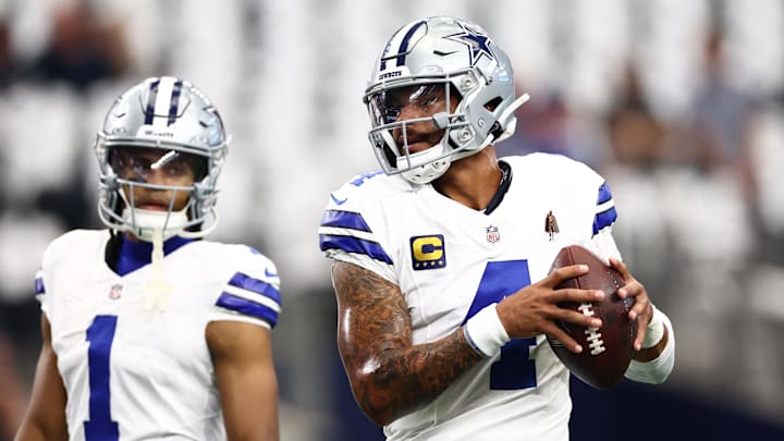 Dallas Cowboys quarterback Dak Prescott during warmups as wide receiver Jalen Tolbert looks on before the game against the New York Giants Dallas Cowboys quarterback Dak Prescott during warmups as wide receiver Jalen Tolbert looks on before the game against the New York Giants