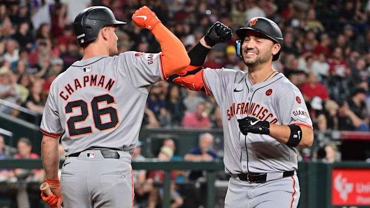 Sep 23, 2024; Phoenix, Arizona, USA;  San Francisco Giants outfielder Michael Conforto (8) celebrates with third base Matt Chapman (26) after hitting a solo home run in the fifth inning against the Arizona Diamondbacks at Chase Field. 