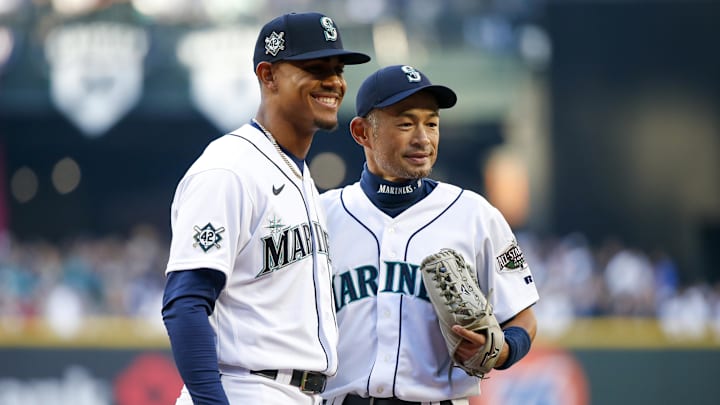 Seattle Mariners center fielder Julio Rodriguez poses with former outfielder Ichiro Suzuki on April 15, 2022, at T-Mobile Park.