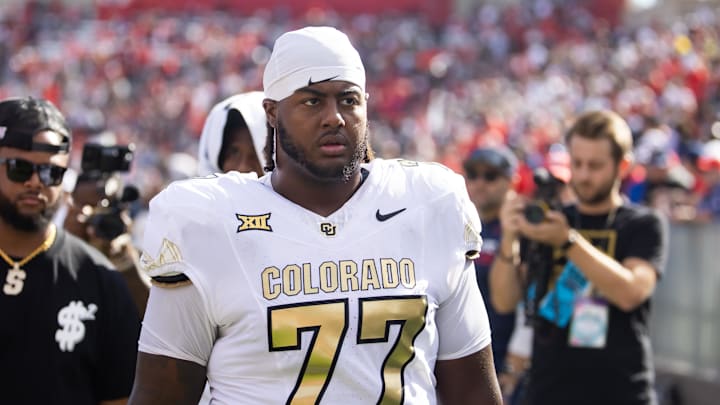 Colorado Buffalos offensive tackle Jordan Seaton (77) against the Arizona Wildcats at Arizona Stadium.