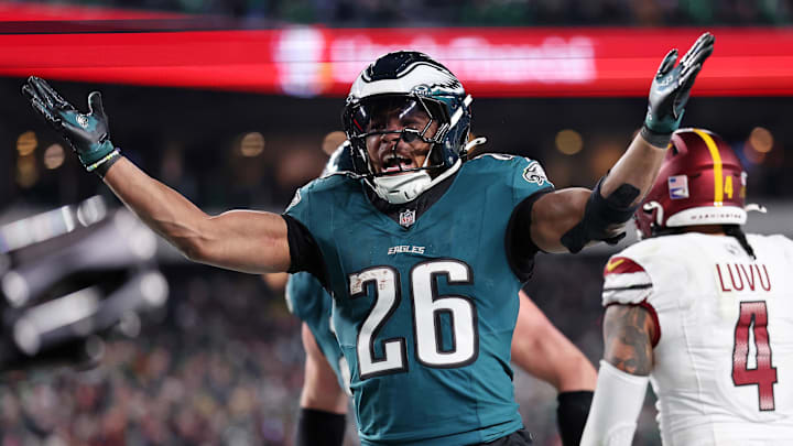 Philadelphia Eagles running back Saquon Barkley (26) celebrates after a touchdown against the Washington Commanders during the second half in the NFC Championship game at Lincoln Financial Field. 