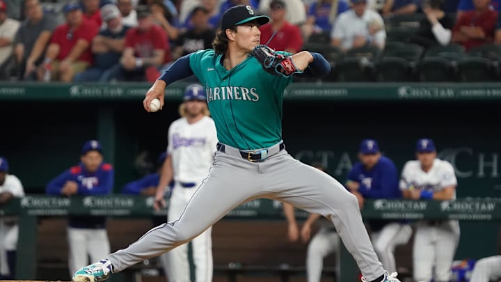 Bryan Woo (22) throws to the plate during the first inning against the Texas Rangers at Globe Life Field. Bryan Woo (22) throws to the plate during the first inning against the Texas Rangers at Globe Life Field.