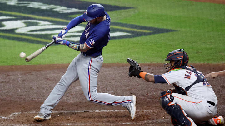 Oct 23, 2023; Houston, Texas, USA; Texas Rangers catcher Jonah Heim (28) singles during the fourth